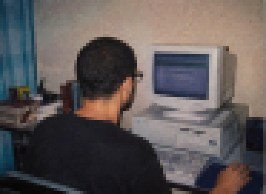 me, in the 90s, doing something on a computer